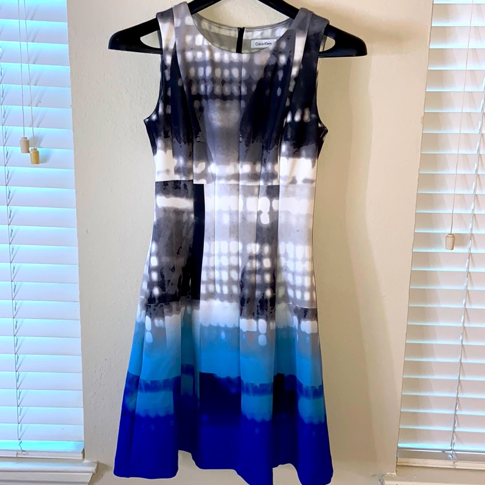 A line, semi pleated dress.